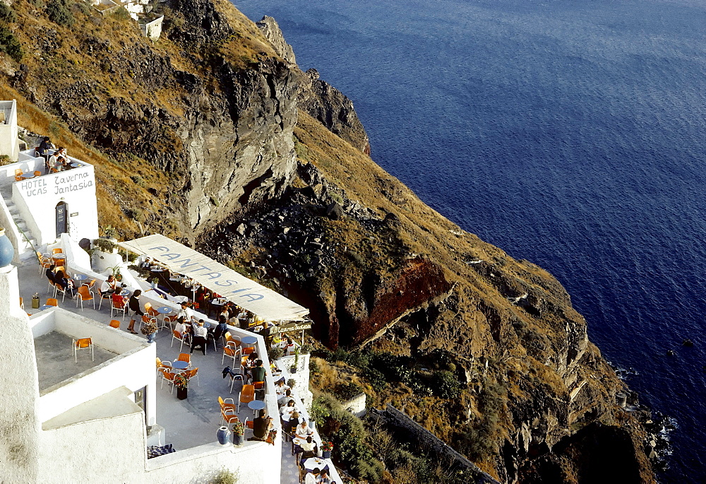 Tavern on the cliffs, overlooking the sea, Fira town, Santorini, Thira, Cyclades, Greece, Europe