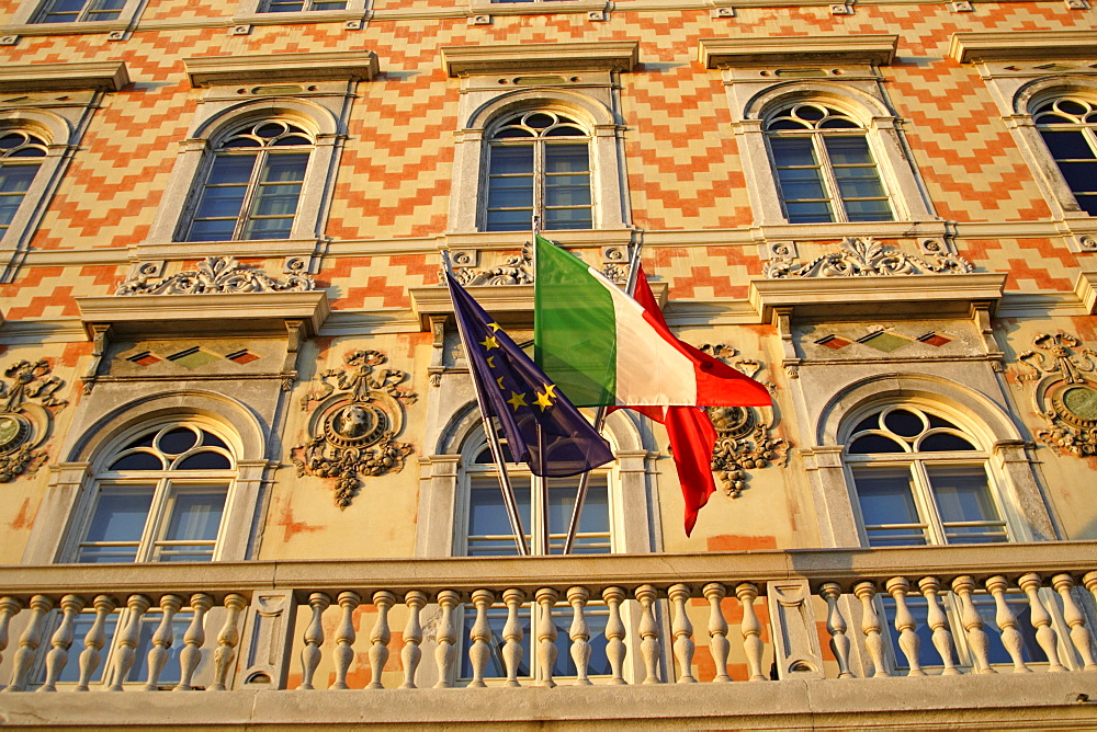 Decorative facade of the Museum of the Grand Canal with Italian and EU flags, Triest, Italy, Europe