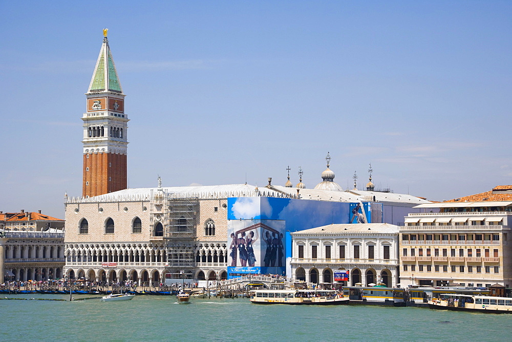 View of the spire of Campanile of San Marco, Bell Tower, and Palazzo Ducale, Palace of the Doges, from Bacino di San Marco, Venice, Italy, Europe