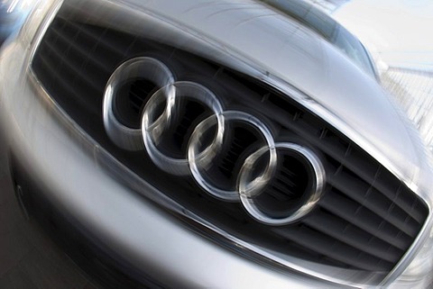 Grille face panel with the company logo of the automobile brand AUDI, motion blur, Germany