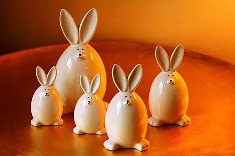 Easter decoration, white porcelain bunnies on a golden plate, Villa Ambiente, Nuremberg, Middle Franconia, Bavaria, Germany, Europe