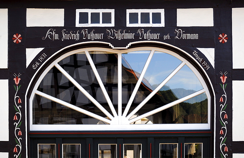 Entrance with inscription of a half-timbered house, 1831, Bad Essen, Lower Saxony, Germany, Europe