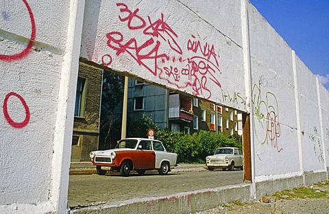 Segments of the Berlin Wall and Trabant cars after the fall of the Berlin Wall, Berlin, Germany, Europe