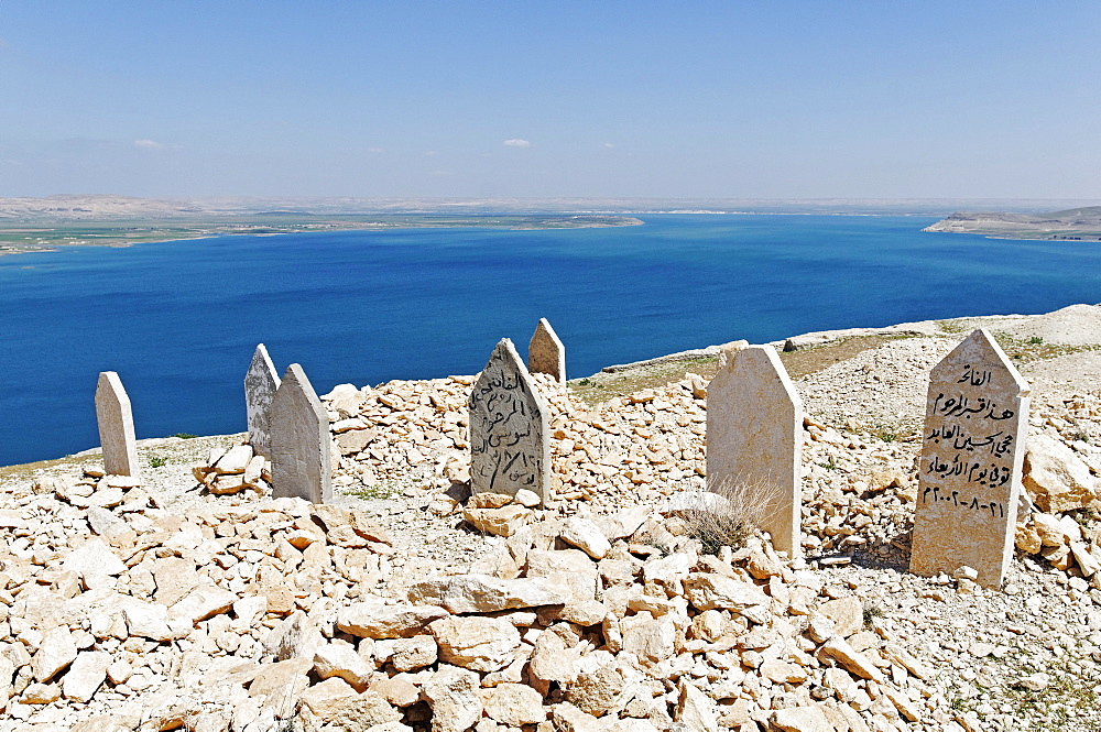 Cemetery on the mountain Jebel Arruda, in the back the Asad reservoir of the Euphrates, Syria, Asia