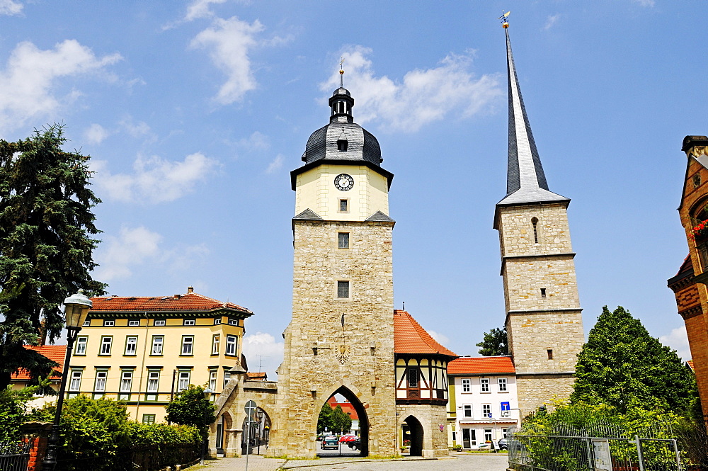 Historic city gate next to Riedturm Tower and the tower of St Jakobus pilgrimage church, Riedplatz Square, Arnstadt, Thuringia, Germany, Europe