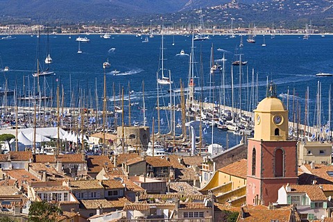 View over the roofs on the bay of Saint-Tropez during the sailing regatta "Les Voiles de Saint-Tropez" in Saint-Tropez, Departement Var, Cote d'Azur, Provence, Southern France, France