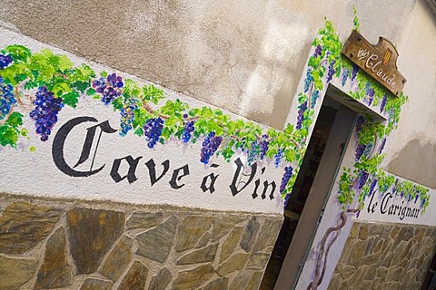 Writing and painting on the front of a wine cellar in Laroque des Alberes, Pyrenees-Orientales, Roussillon, Languedoc-Roussillon, South France, France