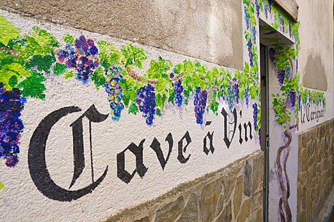 Writing and painting on the front of a wine cellar in Laroque des Alberes, Pyrenees-Orientales, Roussillon, Languedoc-Roussillon, South France, France