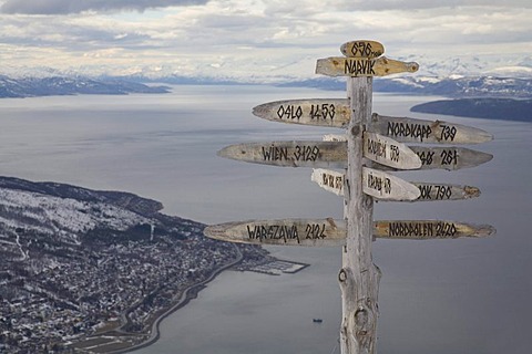 Signpost showing the distance to several cities, skiing area on Fagernes-Fjellet Mountain above Narvik and Ofotfjord, Narvik, Norway, Europe