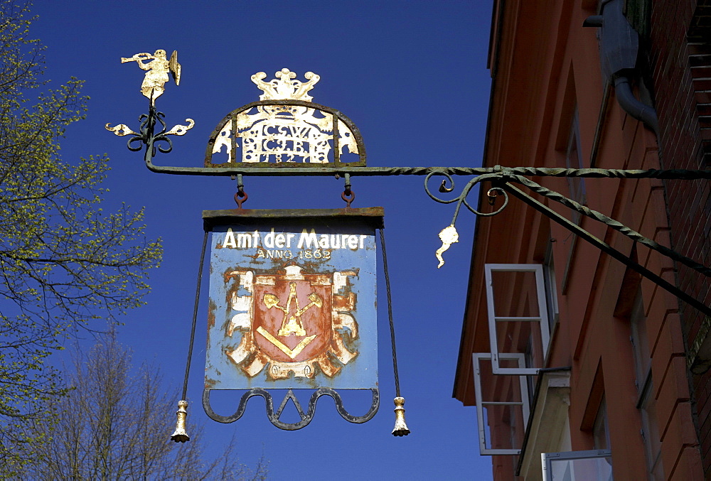 Craftsman advertising panel reading Amt der Maurer on a building in the historic town, Moelln, Holstein, Schleswig-Holstein, Germany, Europe