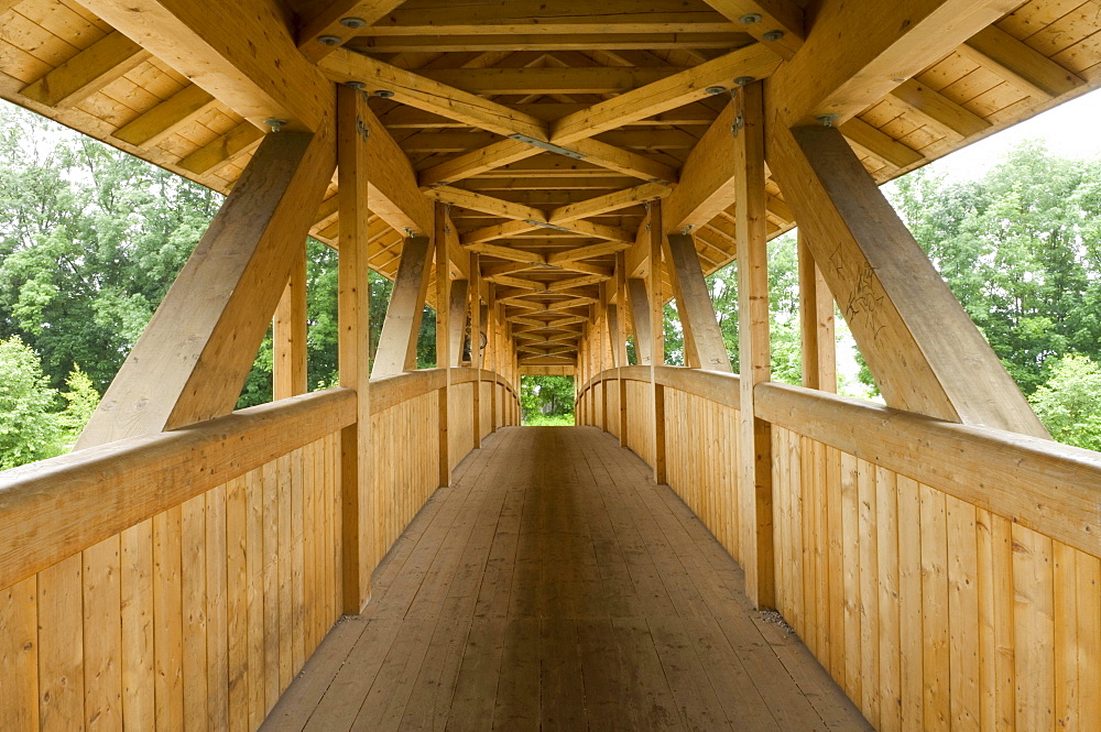 Wooden bridge over Loisach River in Garmisch-Partenkirchen, Bavaria, Germany, Europe