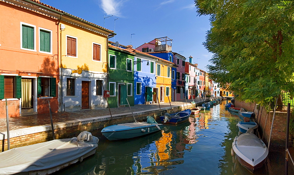 Panoramic view of the city and the colorfully painted houses and canals of Burano, Venice, Italy, Europe