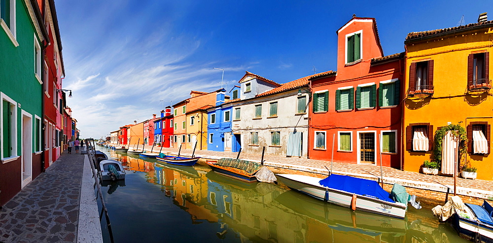 Panoramic view of the city and the colorfully painted houses and canals of Burano, Venice, Italy, Europe