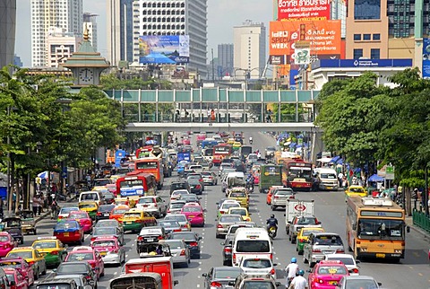 Big city, traffic jam, cars and mopeds, in front of colourful skyline, Ratchadamri Road, Bangkok, Thailand, Southeast Asia