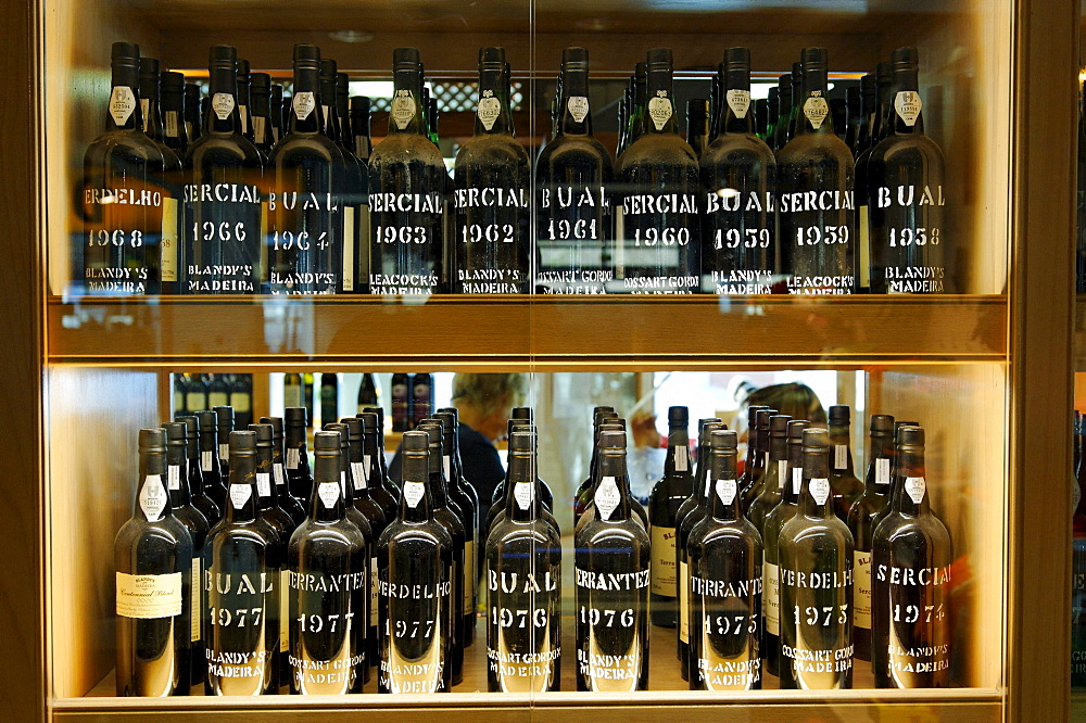 Madeira wines of different vintages, being sold in a shop at Funchal Airport, Madeira, Portugal, Europe