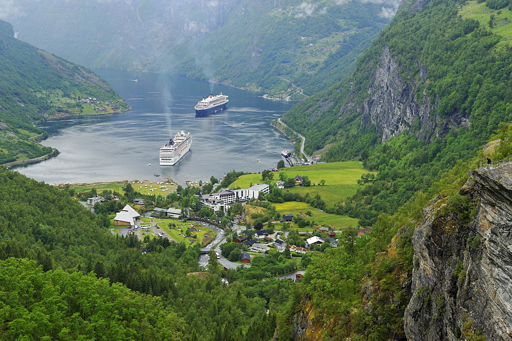 View of the village of Geiranger with cruise ships on the Geirangerfjord, Norway, Scandinavia, Europe