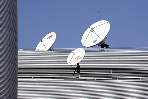 Satellite dishes on the roof of the headquarters and broadcasting centre of the RTL Group, Radio Television Luxembourg, in Luxembourg, Europe