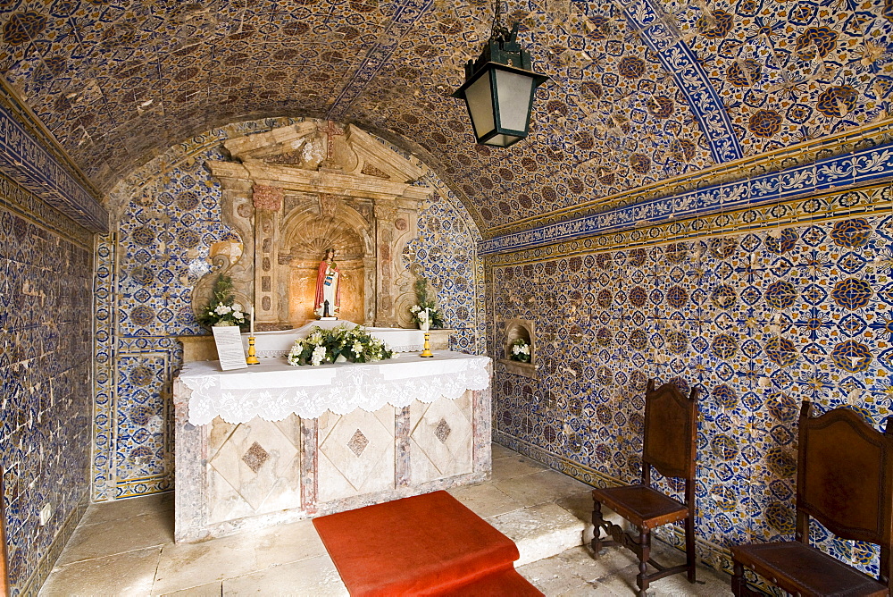 Chapel decorated with ceramic tiles in Fortaleza de Ponta da Bandeira Lagos and the patron saint Santa Barbara in the altar area, Algarve, Portugal, Europe