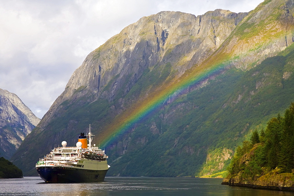 Cruise ship with rainbow at Gudvangen, Naeroeyfjord, Norway, Europe