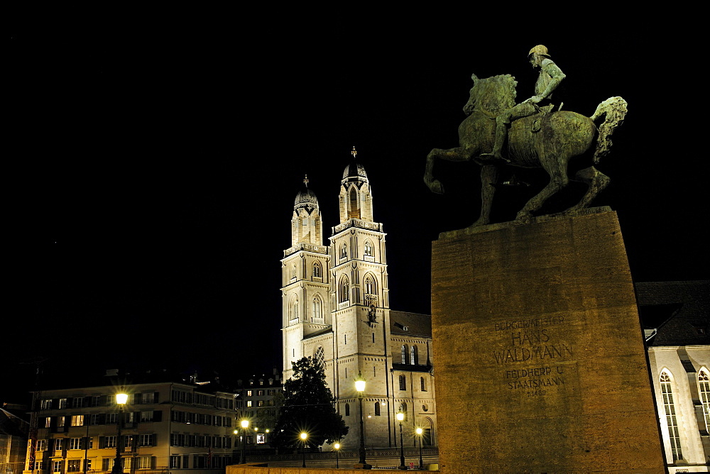 Statue of Hans Waldmann, the towers of the Grossmuenster Church at back, landmark of the city, Zurich, Switzerland, Europe