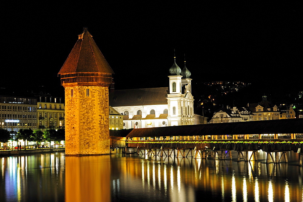 Chapel Bridge over the Reuss River in Lucerne with Jesuit Church at back, Canton of Lucerne, Switzerland, Europe