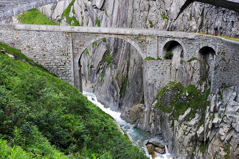 Historic DevilÃ­s Bridge crossing Schoellenen Gorge with Reuss River, canton of Uri, Switzerland, Europe