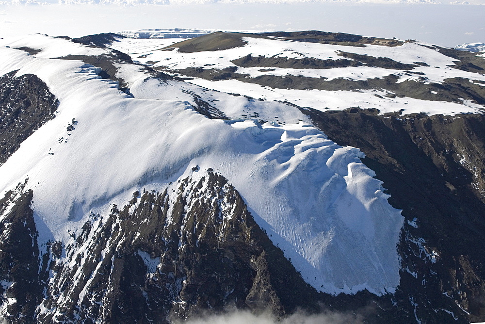 Aerial view of Mt. Kilimanjaro 19335 ft. or 5895 m, Rebmann Glacier in the foreground, summit ridge and crater floor, Tanzania, Africa