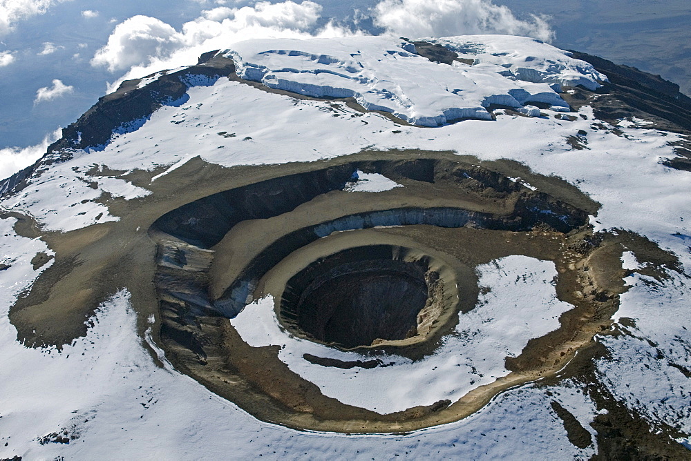 Aerial view of Mt. Kilimanjaro 19335 ft or 5895 m, Reusch crater with ash cone and pit, Tanzania, Africa