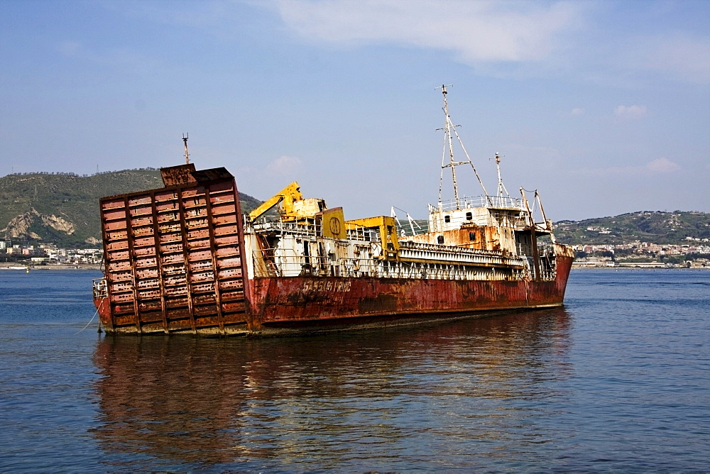 Sunken cargo ship in the port of Bacoli, Pozzuoli, Naples, Italy, Europe