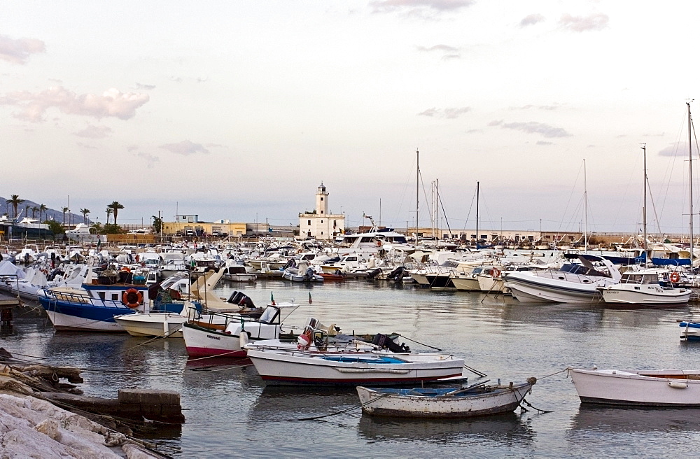 Boats in the port of Manfredonia with the lighthouse at back, Gargano, Foggia, Apulia, Puglia, South of Italy, Europe