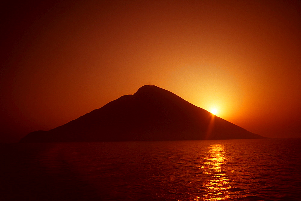 Island at sunrise, Stromboli, Aeolian Islands, Italy, Europe