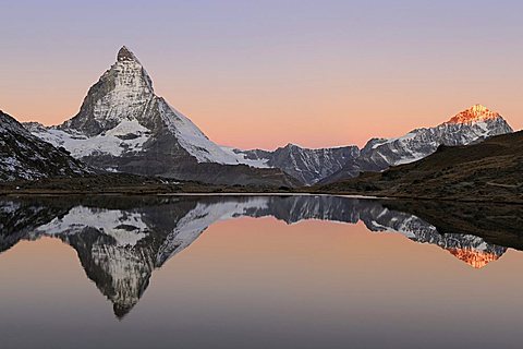 Matterhorn reflection in Riffelsee, Zermatt, Wallis, Switzerland, Europe