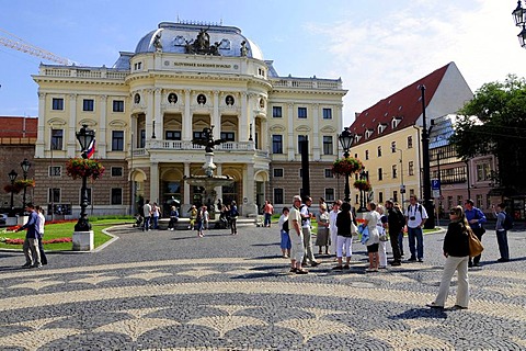 Tourists in front of the Slovak National Theatre, Slovenske narodne divadlo, Bratislava, formerly known as Pressburg, Slovakia, Europe