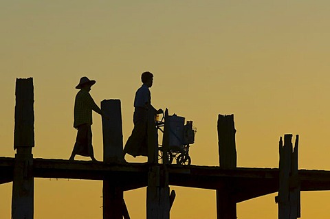 U Bein Bridge at sunset, Thaungthaman lake, Amarapura, Burma, Myanmar, South East Asia