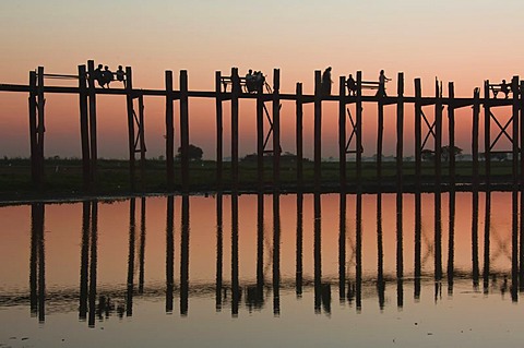 U Bein Bridge at sunset, Thaungthaman lake, Amarapura, Burma, Myanmar, South East Asia