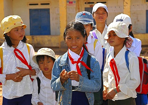 School children wearing pioneer clothing with red ties around their necks, Vietnam, Asia