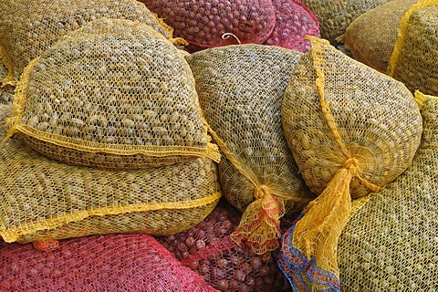 Stacked nets filled with with feed for game