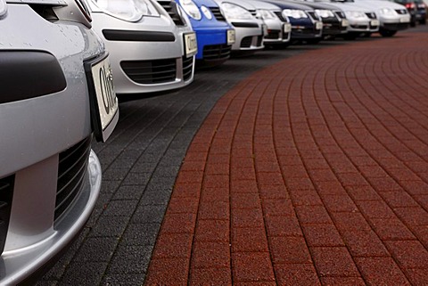 Cars standing on waste dump due to the crisis in the automobile industry