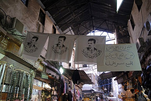 Flags with portrait of president Baschar-al-Assad in the souk in the historic city centre of Damascus, Syria, Middle East, Asia