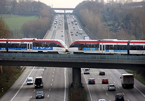 Local train, commuter train, crossing the A3 motorway near Mettman, Erkrath, North Rhine-Westphalia, Germany, Europe