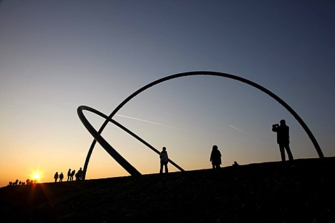 Arcs of the Horizon Observatory with visitors at sunset on Hoheward waste dump, Herten, North Rhine-Westphalia, Germany, Europe