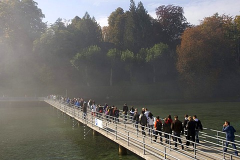 People on a jetty at the harbour, Mainau Island, slight fog, Lake Constance, Baden-Wuerttemberg, Germany