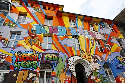 Multicolored graffiti house facade, Kiefernstrasse 21, old houses of former squatters, Flingern, Duesseldorf, North Rhine-Westphalia, Germany, Europe