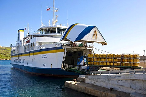 Ferry from Malta being loaded with vehicles with hazardous materials, port of Mgarr, Mgarr, Gozo, Malta, Europe