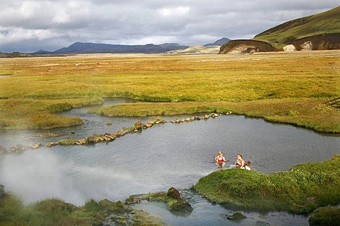 Three Icelandic women with beer in the warm spring, hot pool, Landmannalaugar, Iceland, Europe