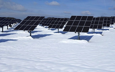 Big Photovoltaic system, solar plant, in snow, Oberruesselbach, Middle Franconia, Bavaria, Germany, Europe