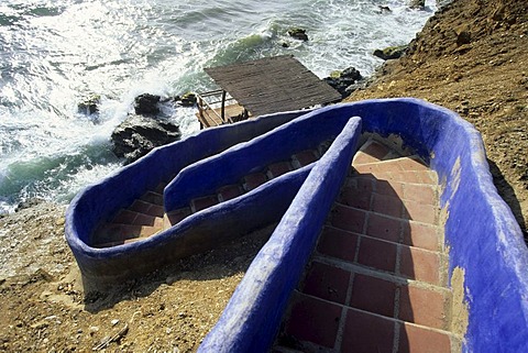 Blue stairs towards the water, Caribbean Sea, near Guarame, Isla de Margarita, The Caribbean, Venezuela, South America