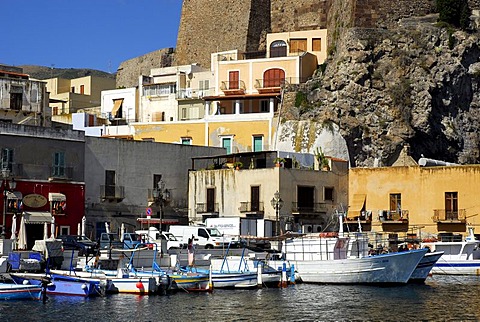 Small fishing boats and houses in the port of Marina Corta in the city of Lipari on Lipari Island, Aeolian or Lipari Islands, Tyrrhenian Sea, South Italy, Italy, Europe