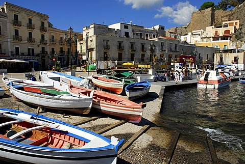 Small fishing boats and houses in the port of Marina Corta in the city of Lipari on Lipari Island, Aeolian or Lipari Islands, Tyrrhenian Sea, South Italy, Italy, Europe