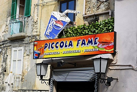 Luminous sign on a facade in the historic centre of Tropea, Vibo Valentia, Calabria, South Italy, Europe